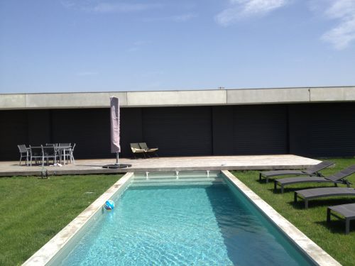 Maison moderne avec piscine a Lavernose Lacasse