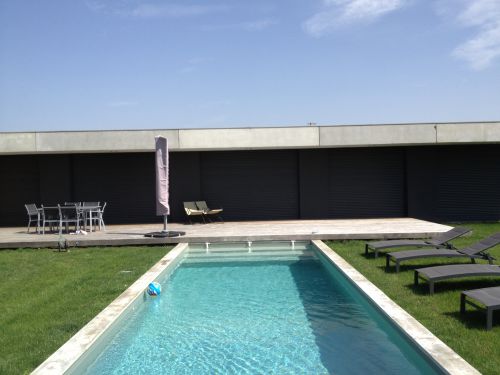 Maison moderne avec piscine a Lavernose Lacasse